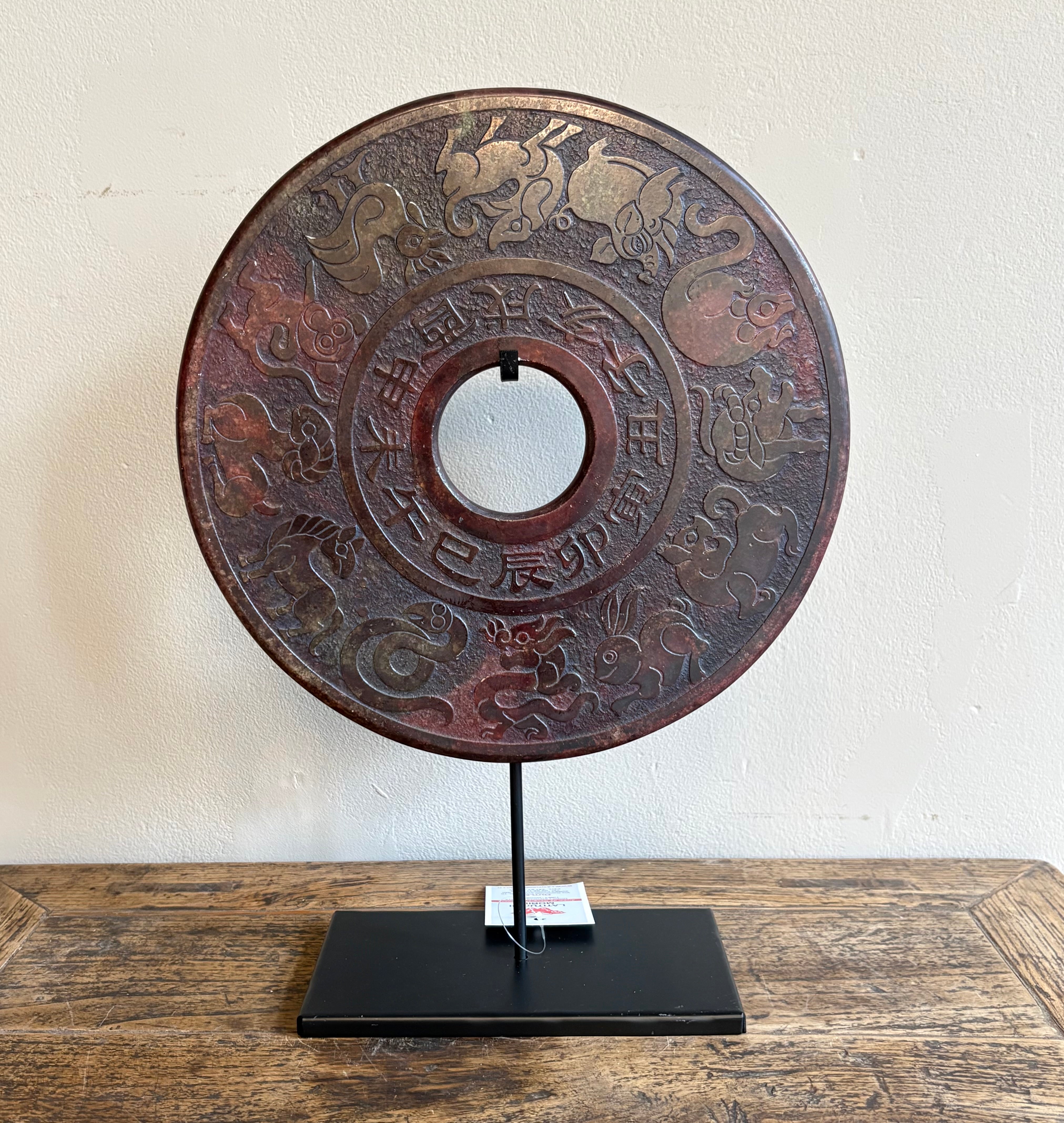 DISCO ORNAMENTALE IN PIETRA SU PIEDISTALLO