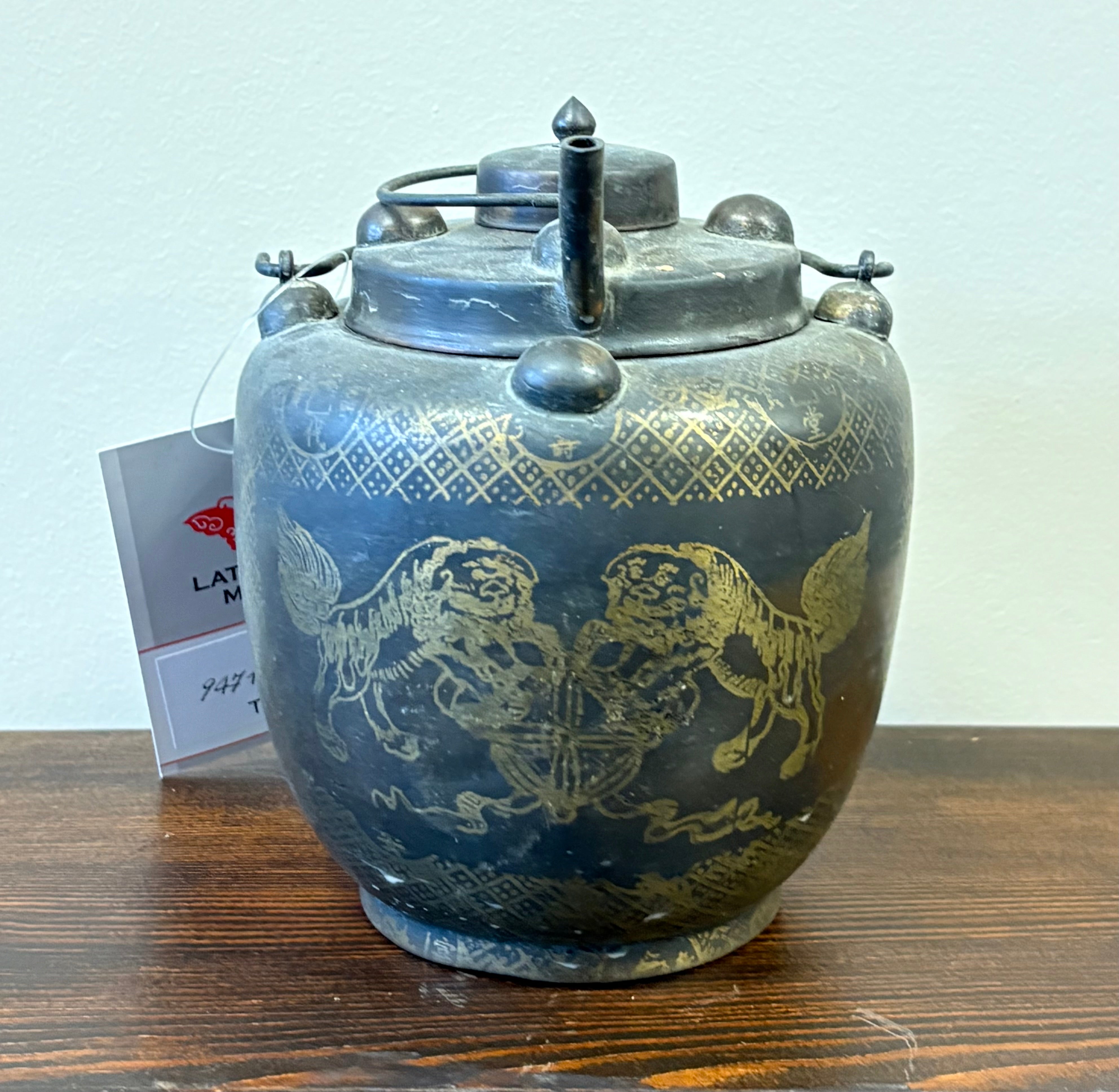 TEIERA IN METALLO CON IDEOGRAMMI